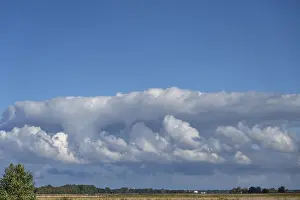 Uninhabited Baltic Coast Prints: Clouds above the lagoon landscape