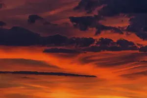 Dramatic Evening Atmosphere Prints: Clouds at the red evening sky after sunset