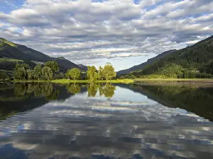 Images Dated 13th June 2024: Clouds are reflected in the lake, Gaishorn am See Print