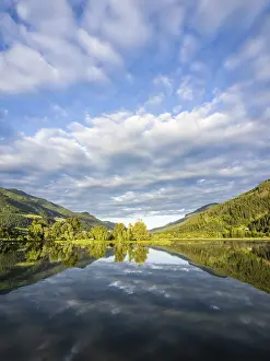 Overcast Sky Photography Prints: Clouds are reflected in the lake