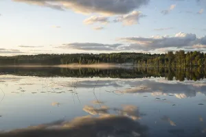 Atmospheric Evening Light Shot Prints: Clouds reflected on the water surface