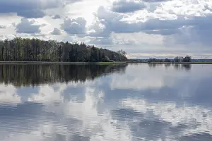 Cloudy Sky Reflections Prints: Clouds reflected in the water, trees