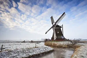 Cloudy Sky Landscape Prints: Cloudscape over Dutch windmill in Groningen