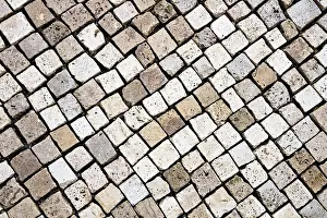 Deserted Cobblestone Streets Prints: Cobblestone pavement