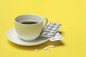 Healthcare System Risks Prints: Coffee in a cup and medication