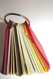 Office Supply Stationery Prints: Colored paper stack isolated on white background
