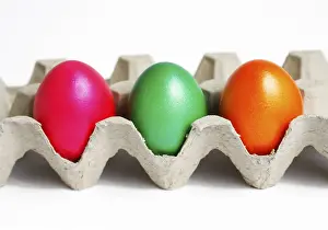 Studio Shot Of Easter Eggs Prints: Coloured eggs, Easter eggs, in an egg carton
