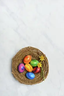 Colourful Easter Eggs Prints: Colourful Easter eggs in Easter nest