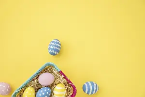 Colourful Easter Basket Prints: Colourful easter eggs small basket yellow table