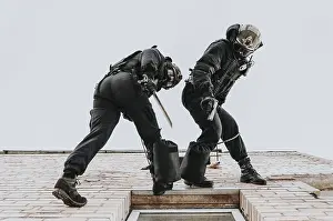 Emergency Response Team Prints: Two commandos train at the base