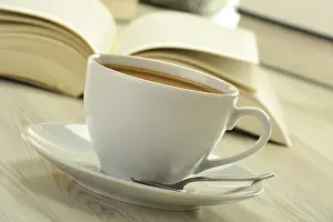 Educational Institution Scene Prints: Composition with books and cup of coffee on the table