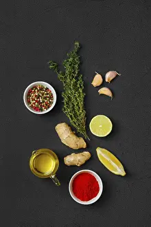 Colorful Vegetarian Dish Prints: Composition with condiments on black background