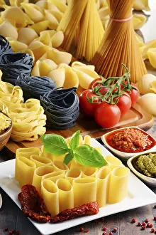 Kitchen Table Still Life Prints: Composition with different sorts of pasta on kitchen table