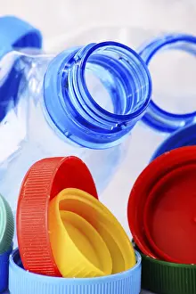 Environmental Conservation Efforts Prints: Composition with plastic bottles and caps