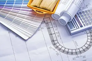 Rolled Up Blueprints Prints: Composition of tools stack rolled up white blueprints calculator paintbrushes in paint can