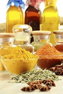 Indian Spice Selection Prints: Composition with variety of spices on kitchen table