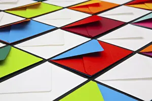 White Envelopes Prints: Composition with white and colored envelopes on the table
