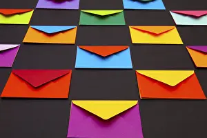 Holiday Table Setting Prints: Composition with white and colored envelopes on the table