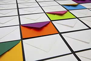 White Envelopes Prints: Composition with white and colored envelopes on the table