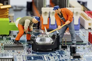 Data Security Concept Prints: Computer board and worker, symbol photo for computer