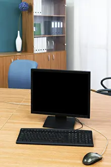 Empty Office Desk Setup Prints: Computer on a desk in a modern office
