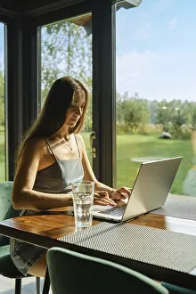 Remote Work Concept Prints: Concept of remote work, workspace tranquility and technology use in natural settings