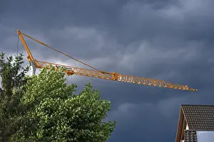 Deserted Construction Site Prints: Construction crane in a thunderstorm