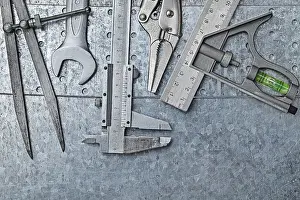 Metallic Background Prints: Construction Tools Composed On Metallic Background