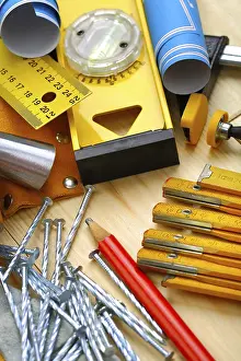 Studio Shot Of Carpentry Tools Prints: Construction tools on wood