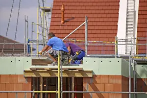 German Construction Industry Prints: Construction worker (bricklayer) on the building site (Mutterstadt development area)