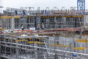 Large Construction Sites Europe Prints: Construction worker on a large building site