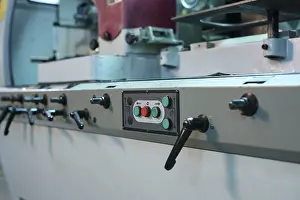 Industrial Machine Prints: Control panel with buttons and levers on machine