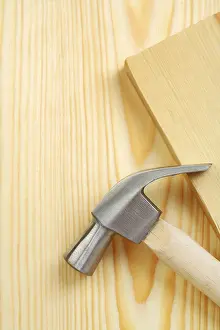 Studio Shot Of A Hammer Prints: Copyspace hammer on timber