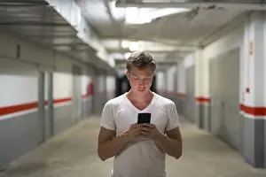 Male Portrait Photography Prints: In the corridor of storage warehouse