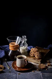 Rustic Coffee Setup Prints: A cozy setup featuring a rustic ceramic cup of coffee