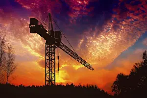 Red Sky At Dawn Prints: The crane at sunset
