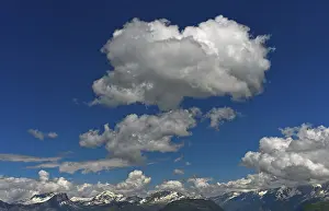 Mont Blanc Massif Scenery Prints: Cumulus clouds over mountain range