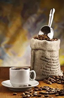 Dark Wooden Board Prints: Cup with coffee and sack