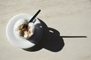Coffee On A Table Prints: Cup of coffee with shadow