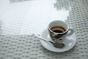 Plain White Background Photo Prints: Cup of coffee on white table. Space for text