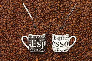 Coffee Beans Prints: Two Cups of coffee on a table full of coffee beans