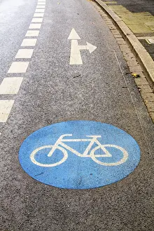 Road Safety Markings Prints: Cycle path marking on a pavement