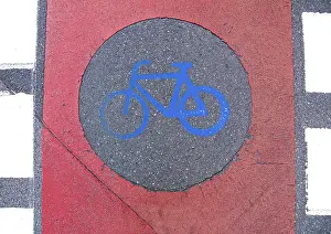 Road Safety Markings Prints: Cycle path marking on a pavement