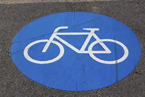 Road Safety Markings Prints: Cycle path marking on a pavement