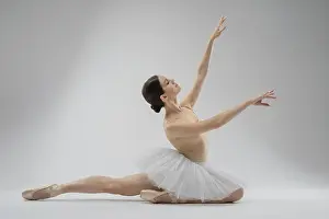 Female Dancer Prints: A dancer gracefully executes a pose