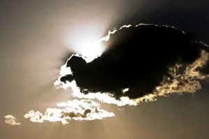 Cloudy Atmosphere Photography Prints: Dark cloud in back light