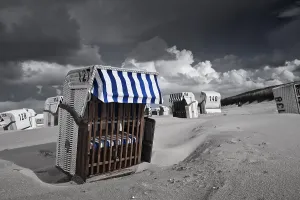 Deserted Beach Chairs Prints: Beach chairs, dramatic clouds in the sky