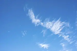 Clear Blue Sky Prints: Delicate, white feather clouds