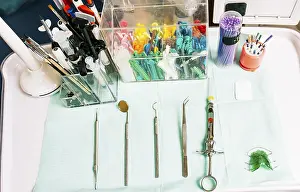 Healthcare Professional Tools Prints: Dentist tools on the table. Top view of stomatologist tools on table