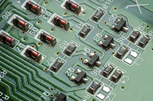 Computer Circuit Board Prints: Details of a computer electronic circuit board with components transferring data